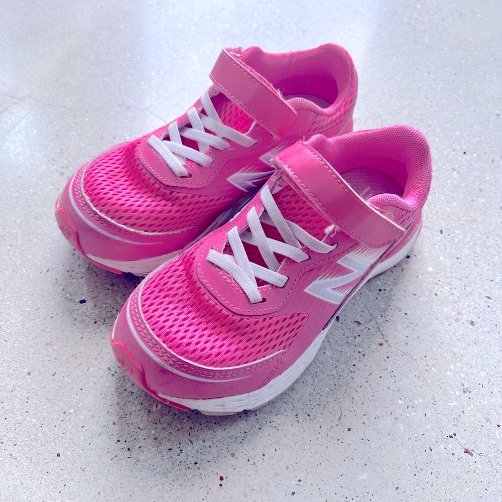 Pink New Balance tennis shoes